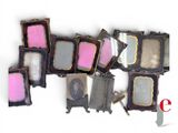 a lot of old picture frames on a white background