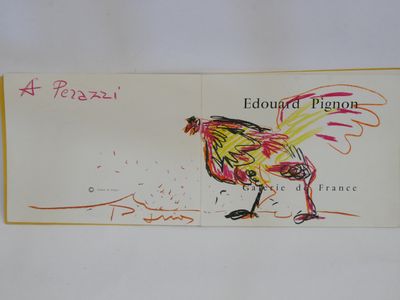 a drawing of a rooster on a postcard on a table