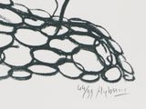 a black and white drawing of an apple on a table