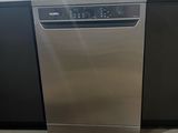 a picture of a stainless steel dishwasher in a kitchen