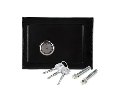 a black safe box with keys and a bunch of keys in it