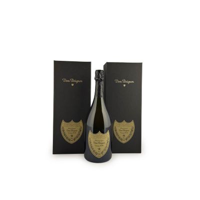 a bottle of champagne in front of a black box