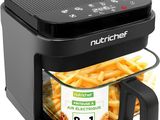 a close up of an air fryer with french fries in it