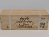 a wooden box with a label on it that says grand vin de laffite rotteschild