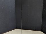 an image of a floor lamp in a corner of a room