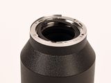 a close up of a metal object on a white surface