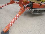 an image of a construction vehicle with a crane attached to it ' s back