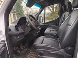 an image of a van with the driver ' s seat down