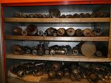 many different types of tools on the shelves