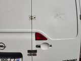 a white van that has been vandalized with bullet holes