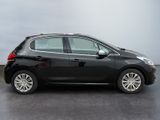 a picture of a black car that is parked in a garage