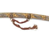 an image of a dagger with a chain around it