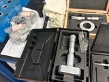 many different tools that are sitting on a table