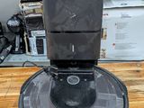 an image of a coffee maker sitting on top of a wooden table