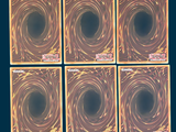 four square coasters with a picture of a black hole in the middle