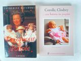 two books on a white table with a picture of a woman and a baby