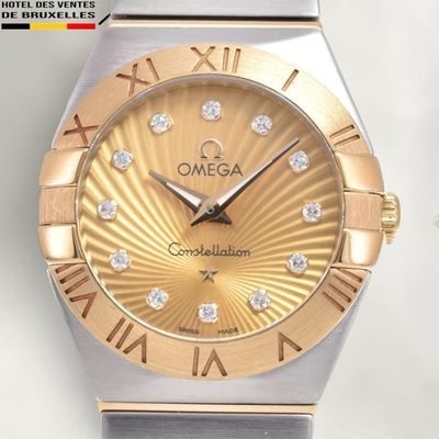 an image of a close up of a wrist watch with roman numerals
