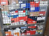 a large metal cart with many boxes on top of it