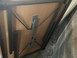 a wooden door with a metal latch on it