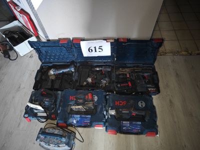 a lot of tools that are sitting on the floor
