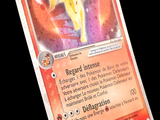 un gros plan d'une carte Pokémon sur laquelle figure un dragon jaune