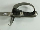 a silver and black sword on a white surface
