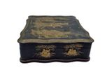a black box with gold decorations on it