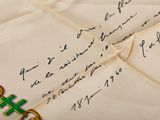 a close up of a piece of paper with writing on it