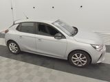 a picture of a white car parked in a garage