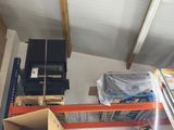a room with a lot of boxes and boxes on the floor