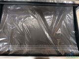 a plastic bag that is sitting on top of a stove