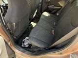 the back seat of a car with the door open and the door open