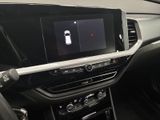 a picture of a car dashboard with a cell phone in it