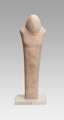 an image of a sculpture of a man ' s torso on a stand