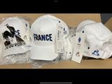 three hats in a box with a price tag on them