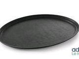 a black tray with a black lid sitting on a white surface
