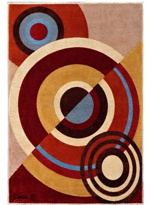 un tapis orné de cercles, encore et encore