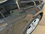 a close up of a car with a sticker on it