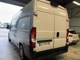 a white van that is parked in a garage