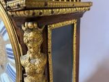 a clock that is sitting on top of a table