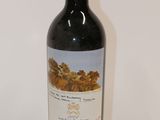 a bottle of wine that is sitting on a table