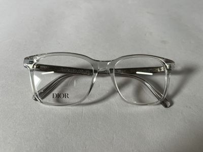 glasses on a table with a white table cloth and a white table cloth