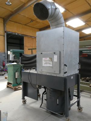a machine that is sitting inside of a building