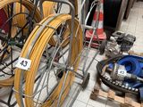 a lot of different types of wires on the floor