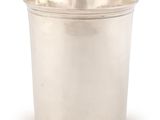 a silver cup on a white background with a white background