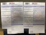these are two papers with a picture of a person holding a cell phone