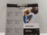 the box is open to show the contents of a pair of headphones