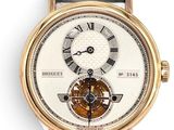une image d'un gros plan d'une montre-bracelet avec des chiffres romains