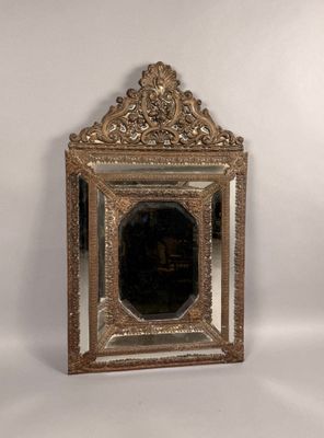 an image of a mirror with a gold frame on a white background