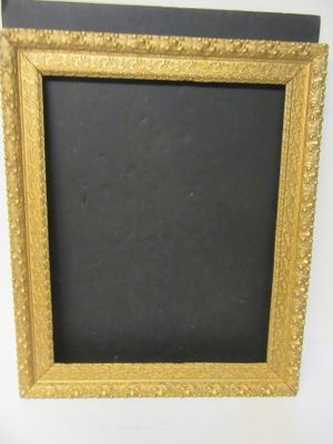 an old picture frame with a chalkboard in the middle of it